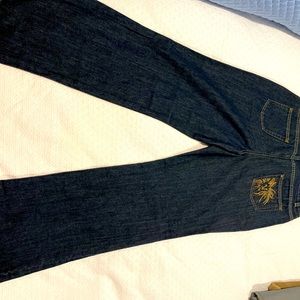 Ann Kline ladies jeans with lion logo on back pocket size 12